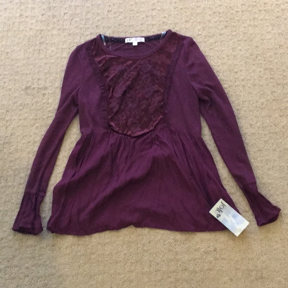 A maroon shirt